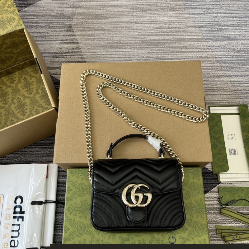 G*u*i top handle bags